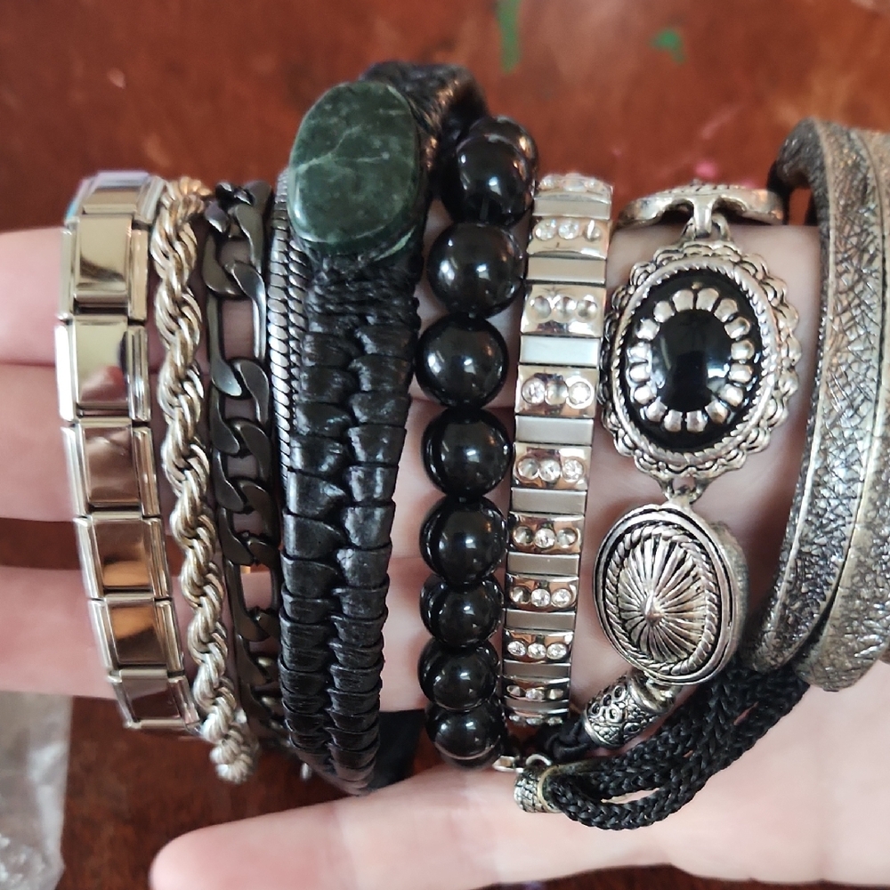 Silvertone And Black Bracelets